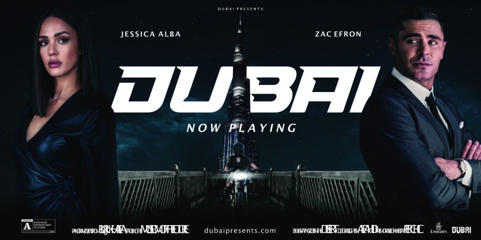 Póster de Dubai Presents con Jessica Alba y Zac Efron